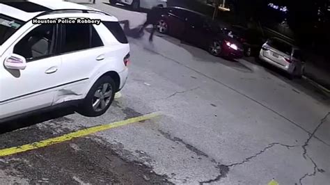Video Woman Dragged In Violent Purse Snatching Nearly Run Over In