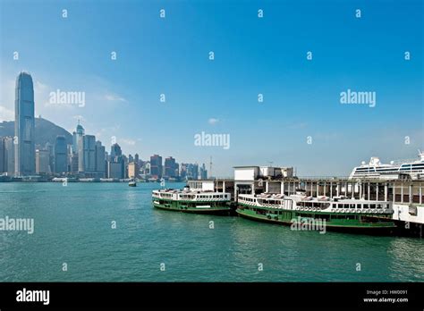 The Star Ferry Pier At Tsim Sha Tsui With 2 Ferries Ready To Leave And