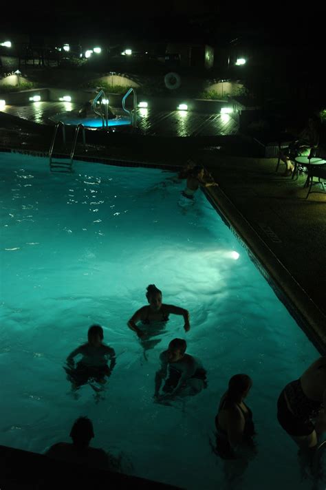 People Night Swimming In The Blue Hotel Pool Getting In A Flickr