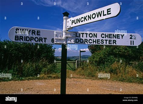 Rural Crossroads Showing Signposts Of Ancient West Dorset Villages