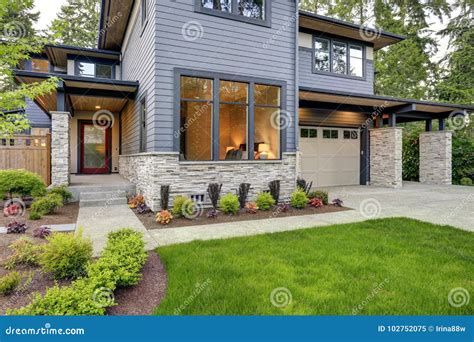 Curb Appeal-Pretty Upscale Two Story Brick House With Arched Door And