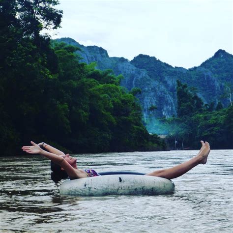how to explore laos on a budget—from magical luang prabang the curious plain of jars and tubing