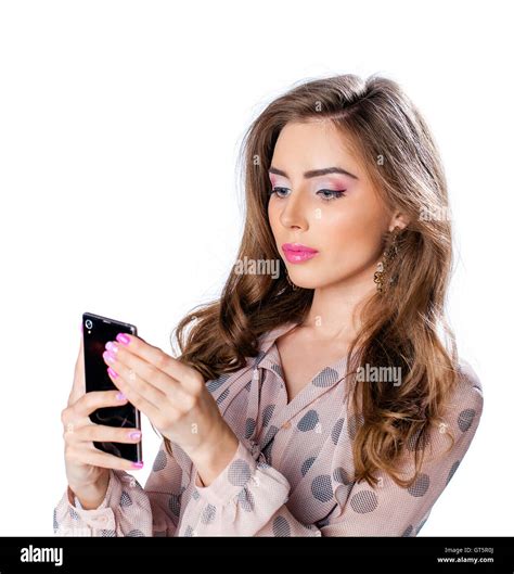 Young Beautiful Girl Taking Selfie With Mobile Phone Isolated On White