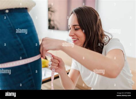 Mid Adult Woman Measuring Thigh Hi Res Stock Photography And Images Alamy