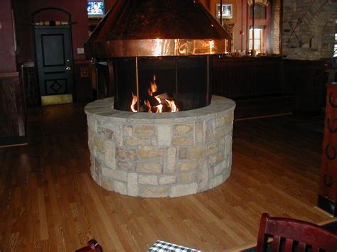 Outdoor fire pit vent hood. indoor+fire+pit | indoor firepit in restaurant | Indoor ...