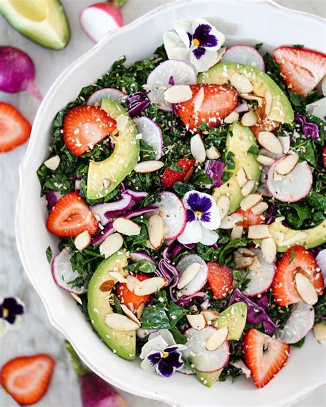 A Delicious And Healthy Kale Salad With Strawberries Coconut Avocado