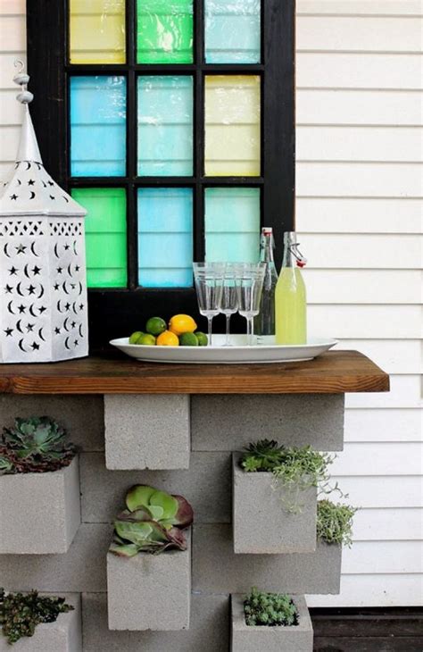 Put 3⁄8 inch (0.95 cm) plywood spacers in between the blocks. Cinder block garden ideas - furniture, planters, walls and ...