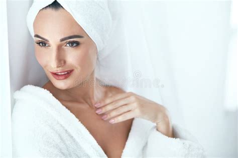Spa Skin Care Beautiful Woman In Towel At Spa Beauty Salon Stock Photo