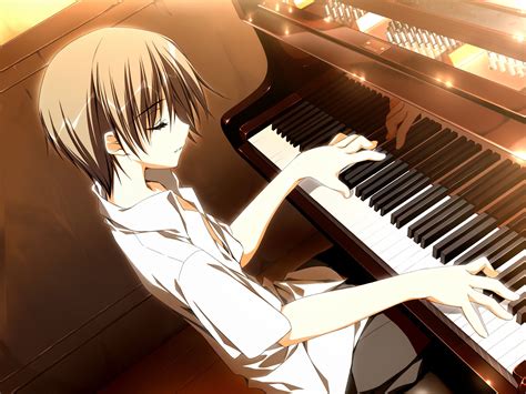 A Person Sitting At A Piano With Their Hands On The Keys