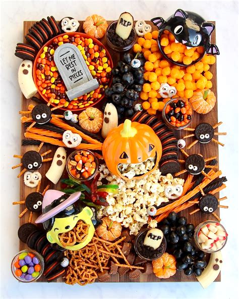 Create At Spooky Snack Board For Halloween That Is Sure To Get All The Ghosts And Goblins