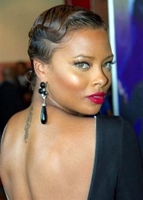 Link to majestic length kinky ponytail: Top 100 Hairstyles for Black Women | herinterest.com