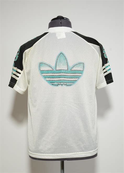 Beige, blue + recommended size: Vintage 80's Adidas t-shirt Perforated White Small