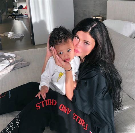 Kylie Jenner Cuddles Up With Daughter Stormi While Showing Support For