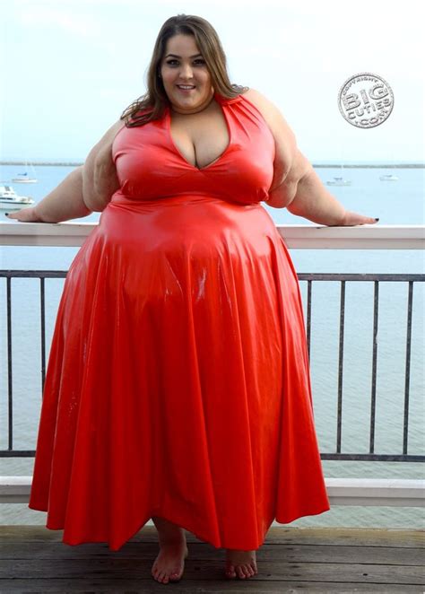 Ssbbw Mary Boberry Wearing A Red Dress At The Seaside