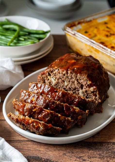 Make the finished meatloaf extra fancy by frosting with mashed potatoes and topping with cheese; Best Classic Meatloaf Recipe | Recipe in 2020 | Classic ...
