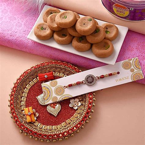 Buysend Stones Rakhi With Pooja Thali And Peda Online Ferns N Petals