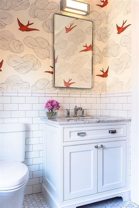 The perfect way to add pattern to your bathroom. Hygge & West Daydream Wallpaper covers the upper wall of a ...