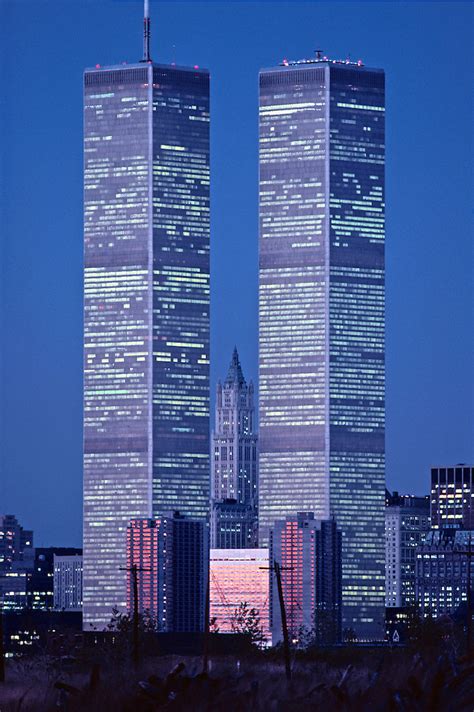 The twin towers were dedicated april 4, 1973. NYC, NY, World Trade Center and Woolworth Building ...