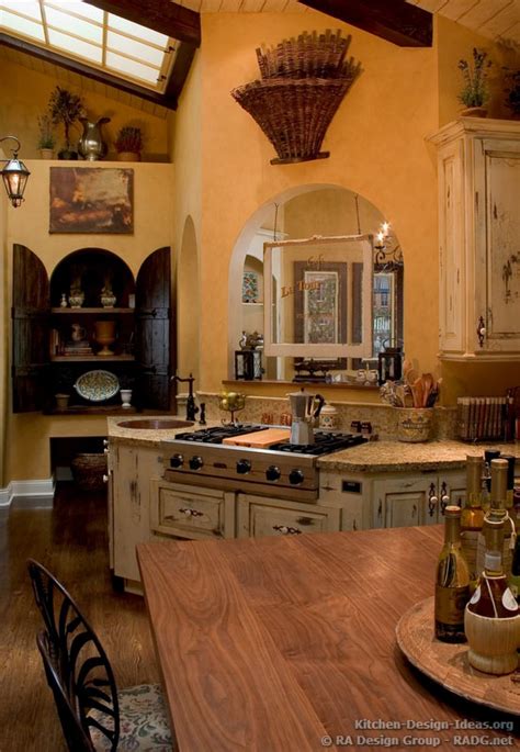 French Country Kitchen With Antique Island Cabinets And Decor