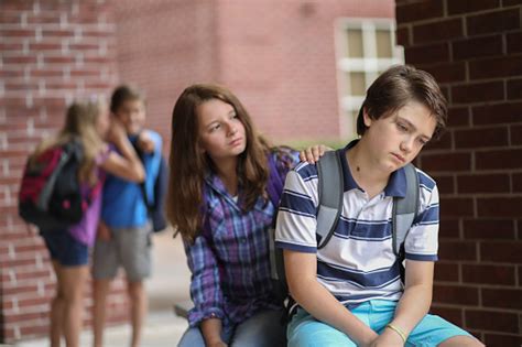 Comforting Friend After Being Bullied Stock Photo Download Image Now