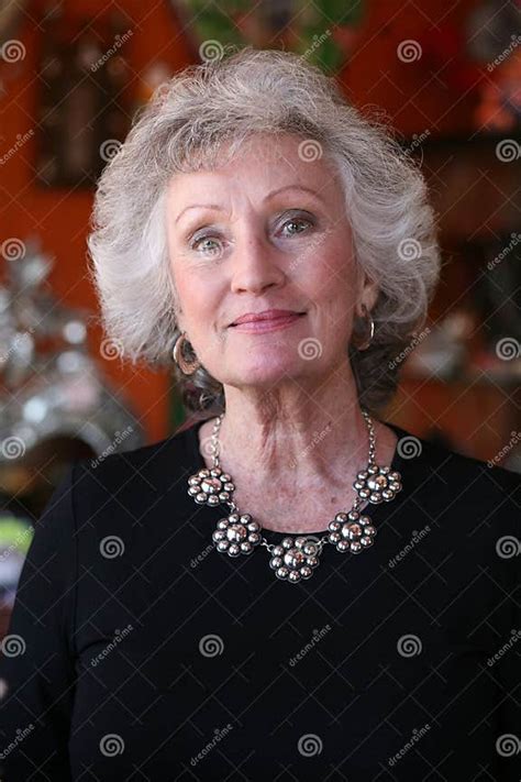 elegant mature woman wearing a silver necklace stock image image of ageing designer 4584203