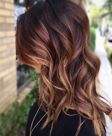 The roots are teased to achieve maximum boost and encourages the waves and flicks through the sides making this look perfect for those with long face shapes. 1001 + Ideas for Brown Hair With Blonde Highlights or Balayage