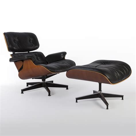 Original Herman Miller Black And Cherry Eames Lounge Chair And Ottoman