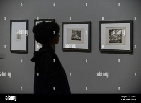 Employees pose during a press preview of ‘The EY Exhibition: Picasso
