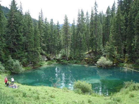 Meditating By Crystal Clear Lake High In The Mountains Clear Lake