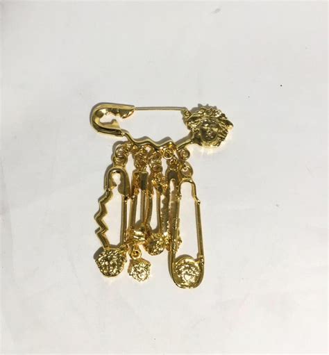Versace Gold Safety Pin Medusa Dangle Brooch At 1stdibs Versace