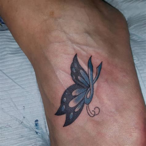 luthfiannisahay: Small Butterfly Tattoo Designs Foot