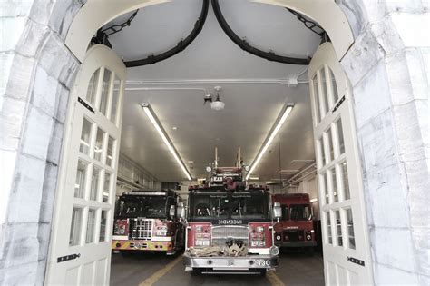 Free Photo Fire Trucks Leaving Fire Station
