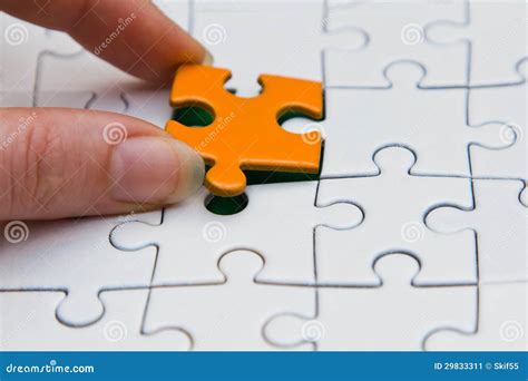 Hands Placing Piece Of A Puzzle Stock Image Image Of Match