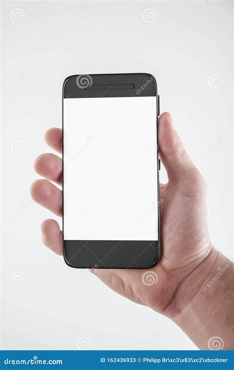 Hand Holding Mobile Smart Phone With Blank Screen Isolated On White