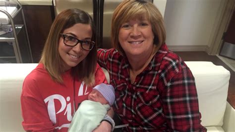 us woman gives birth to her own granddaughter after acting as surrogate for her daughter