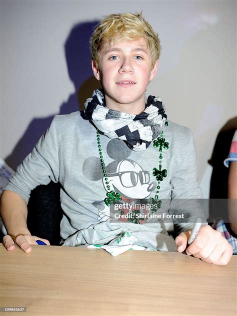 Niall Horan Of One Direction Sign Their New Book One Direction