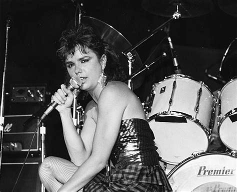 Portrait Of Singer Patty Smyth Performing On Stage With Her Band