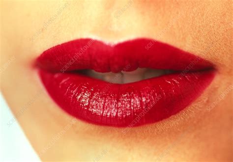 Close Up Of The Mouth Of A Woman Wearing Lipstick Stock