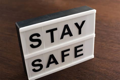 Free Stock Photo 17412 Small Stay Safe Sign On A Table Or Floor