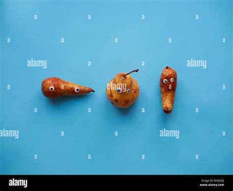 Three Funny Pears With Googly Eyes Stock Photo Alamy