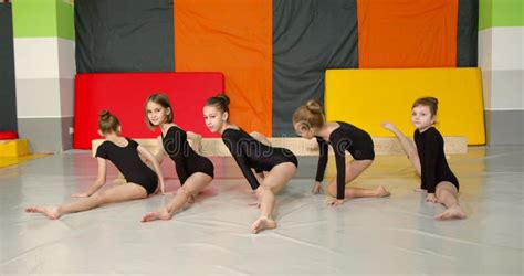 Little Girls Practice At Gymnastics Class In A Studio Stock Video