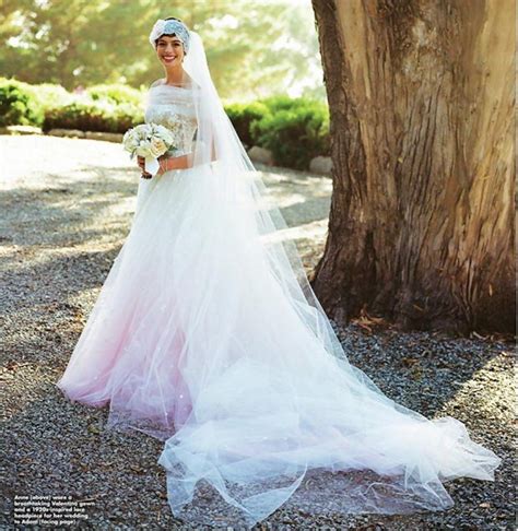 First look at her custom valentino gown. Anne Hathaway's Valentino White Wedding Dress - StyleFrizz
