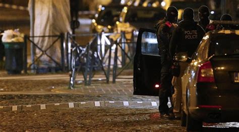 arrests in brussels raids but paris suspect still on run
