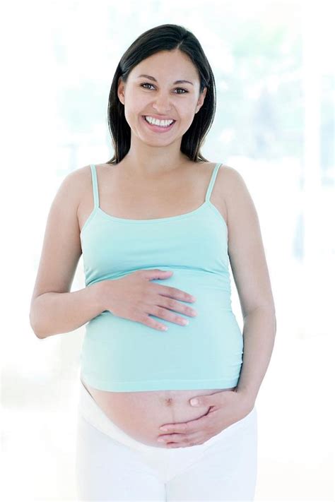 pregnant woman photograph by ian hooton science photo library fine art america