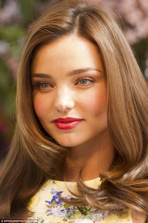 Miranda Kerr Displays Her Famous Figure In A Form Fitting Floral Shift