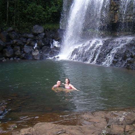 Swimming Under A Waterfall In Kauai Waterfall Kauai Trip