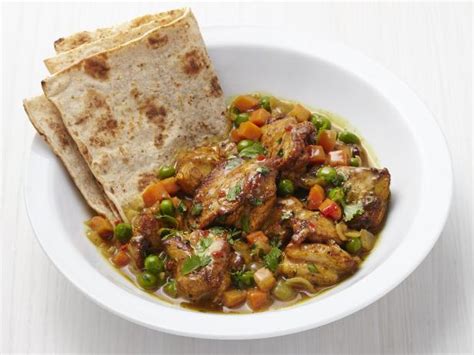 Each serving provides 581 kcal, 34g protein, 59g carbohydrates. Caribbean Chicken Roti Recipe | Food Network Kitchen ...