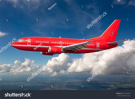 Red Passenger Aircraft Flight Side View Stock Photo 1627789957
