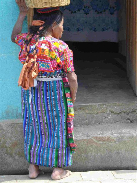 Guatemalan Lady Going To Market In Traditional Handwoven Costume With Ikat Print Threads In