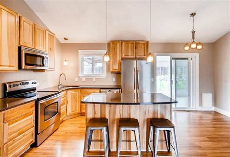 Observe the difference between brightness levels and undertones. What Flooring Goes with Hickory Cabinets? | Hickory ...